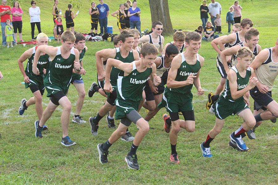 Sophomores Frank McMillin and Justin Bartley, juniors Jesse Stantorf, John Hardgrave, Michael Kephart, and Johnathan Plybon, sophomore Ethan Paxton, and freshman Dallas Larsen start their race in Stover. The boys varsity team placed first.