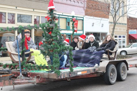 Members of the English Club rode on the float that they had decorated for the Christmas parade on Sat. Dec 6. The parade was held up town.