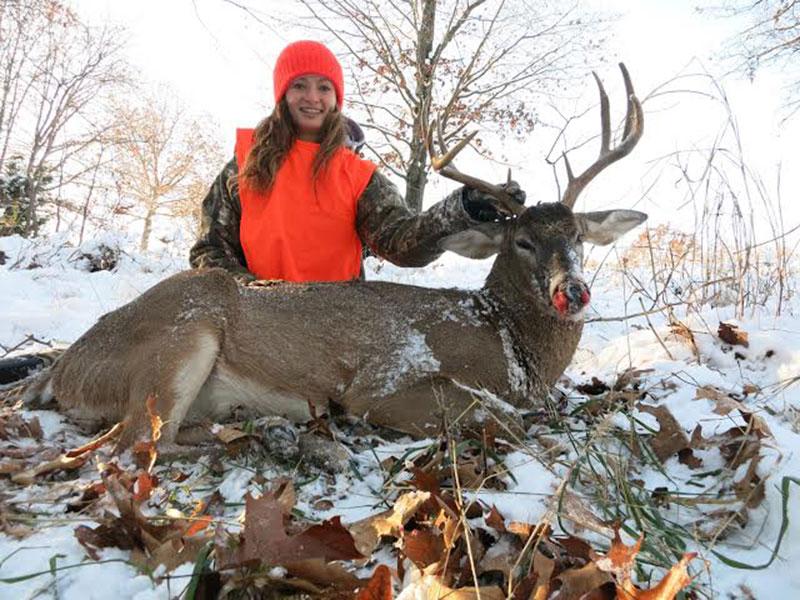 Sophomore Brennan Bell and her buck. 