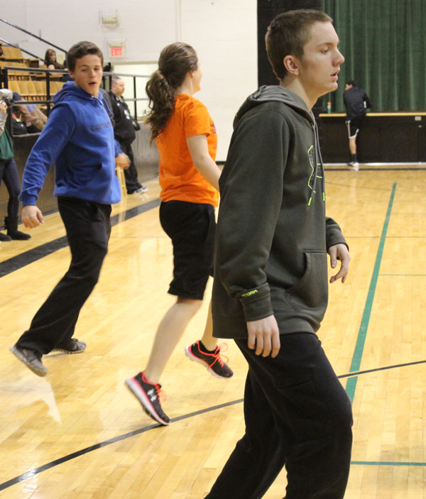 Juniors John Hargrave and Taylor Goetz along with sophomore Anthony Beuke get their exercise in during their physical education class. Most students get their exercise in during school.
