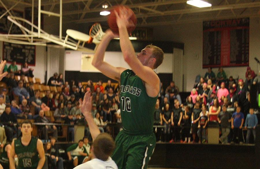 Senior guard Randall Sherman shoots during a championship game against Conway during the Conway Tournament.