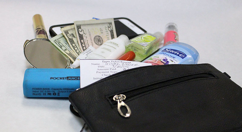 Top 10 prom purse musts: money, perfume, deodorant, lip gloss, gum/mints, phone, phone charger, eyelash glue, hand sanitizer and mascara.
Source: The Wildcat staff