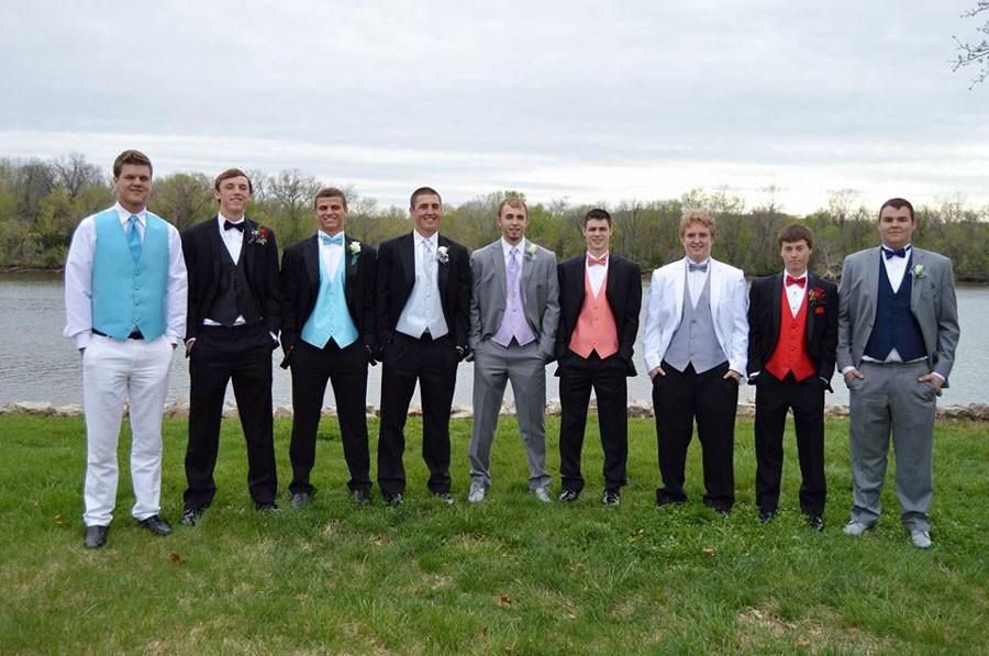 Seniors Kyle Goodsell, Bailey Jelinek, Jeremy Eirman, Joey Cooner, Randall Sherman, Lane England, Jordan Johnson, Alex Letcher and Luke Spry pose for pictures at the Harbor before Prom. Many students gathered at the harbor downtown to take pictures together before going to the school.