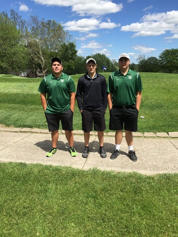 Junior Jamie Jimenez, seniors Even Engebretsen, and Luke Spry pose before competing at the District Golf Tournament.