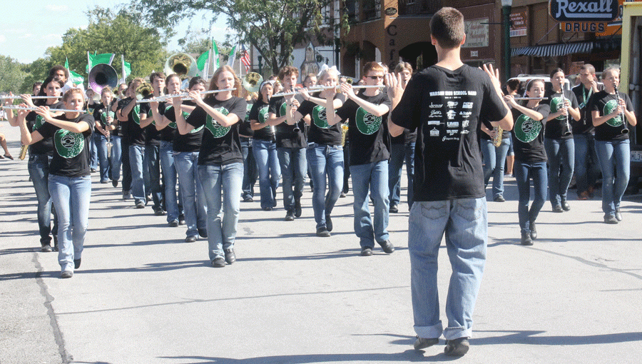 Marching band members are directed by senior drum major Austin Reynolds in the Homecoming parade. The marching band performed ‘Uptown Funk’ by Bruno Mars; this song is also performed as a field show during halftime at the football games.
