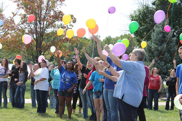 Students, family, and friends attends the balloon release. The balloon release was held on Sunday Sept. 19 at the harbor. 