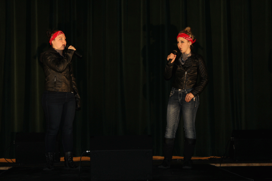 Sophmores Maddie Rozzel and Cora Rodgers stand proudly with thier microphones.This duet sang “Listen” from Dreamgirls. Photo by Deanna Garroutte
