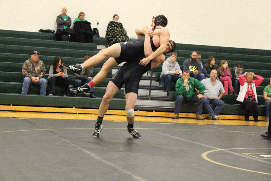 
Senior Trever Surrell takes down a stover wrestler at a Warsaw home tournament on January 16. Surrell won his match.