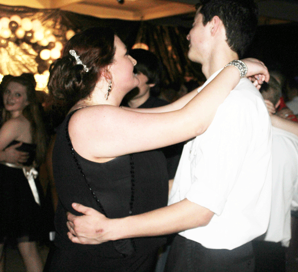 Juniors Kaci Cooner and Joseph Black slow dance. “Echoes was really fun and the theme fit the night.” 