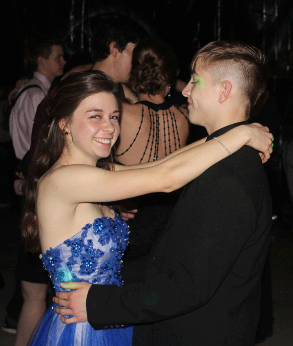Junior Ashlee Kuykendall and sophomore Dallas Larsen sway to a slow song. “Echoes was a blast,” Kuykendall said.