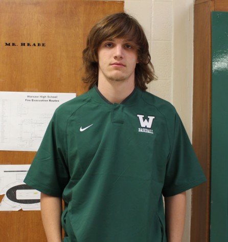 Sophomore Cash Miller stands in front of math teachers Brian Hrabe's door. Miller was chosen as featured player for Baseball. 