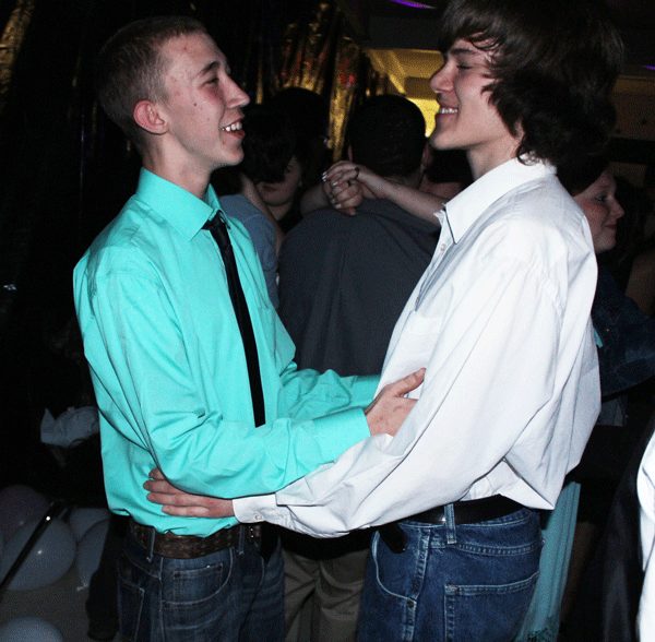 Sophomores Ryan Burks and Eric Smith dance with one another. “We were showing true bro-ship,” Burks said.