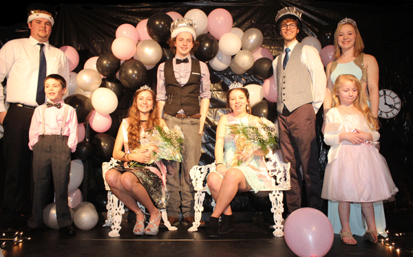 The Echoes royalty shine at the coronation of the Echoes Ball. The court included 2015 Echoes King Luke Spry, Cash Davis, junior princess Bailey Sharp, prince Noah Long, senior queen Alexis Riga, King Carter Phillips, 2015 queen Melissa Pierce, and Kyliegh Connell  on stage as Echoes royalty. “I feel super honored; it was a blessing,” Phillips said.