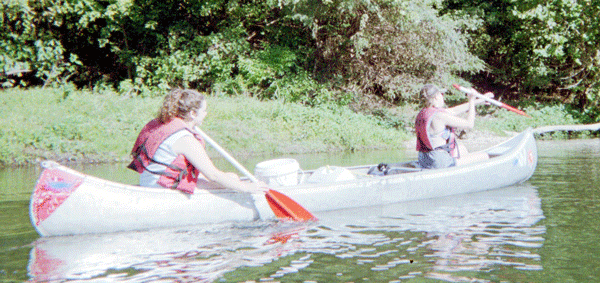 Seniors Haylee Pals and Maddie McMillin canoe down the river on Science Club Float Trip. April 9th was their last Science Club Float Trip. Photo Submitted.  