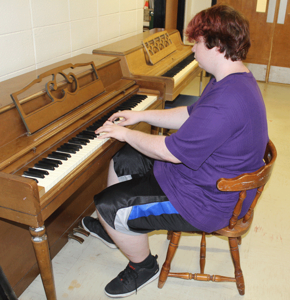 Senior Travis Gibson performs Swan Lake. Travis is currently the only student in Piano 4 and a very gifted pianist.