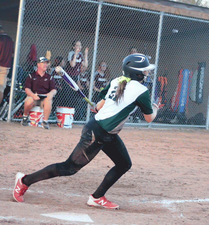 Freshman Aubrie McRoberts hits the ball against Osage. Warsaw lost to Osage 4-5. 

