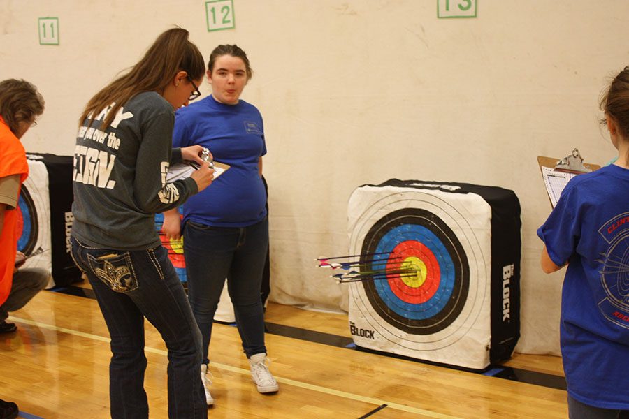 Senior Bailey Sharp tallies up her points that she shot during the tournament on Saturday, February 4. 
