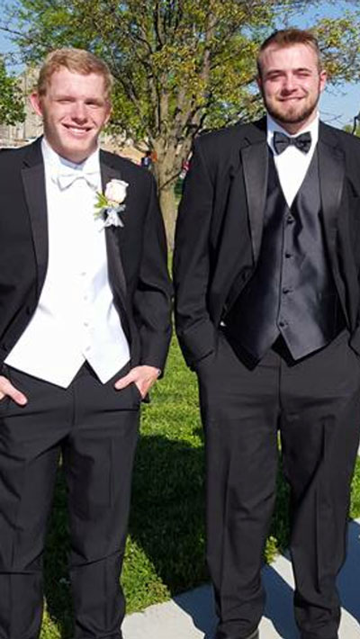 Senior Michael Pierce and 2015 Graduate Dalton Davis take a photo together before prom last year. 