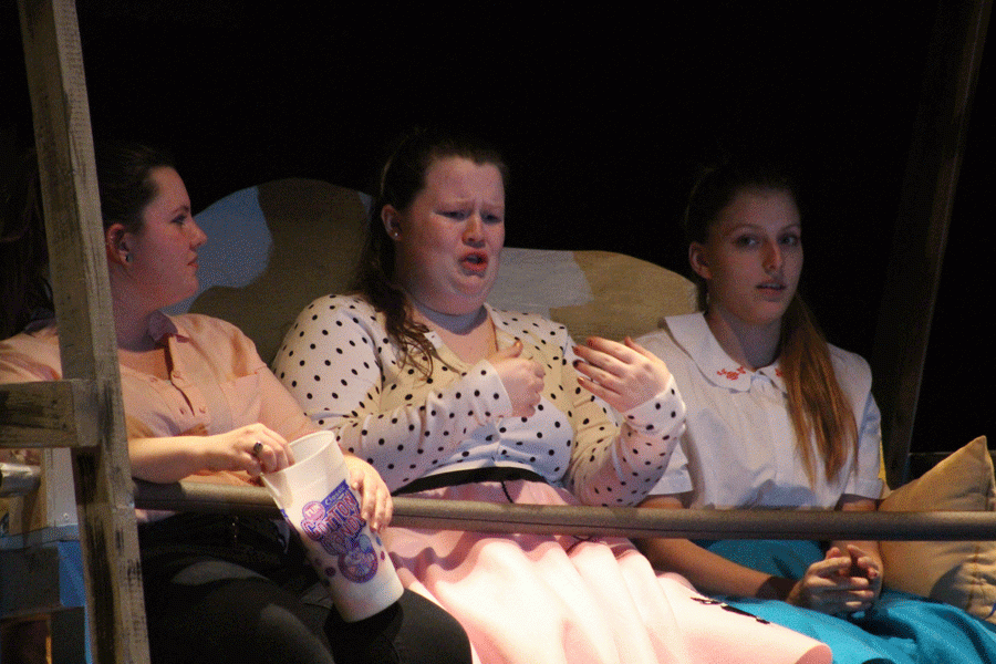 Juniors Kylee Myers, Caitlin Easter, and Mikayla Andrews rehearse a scene from the one act play. District speech contest was March 3 and 4 at State Fair Community College.