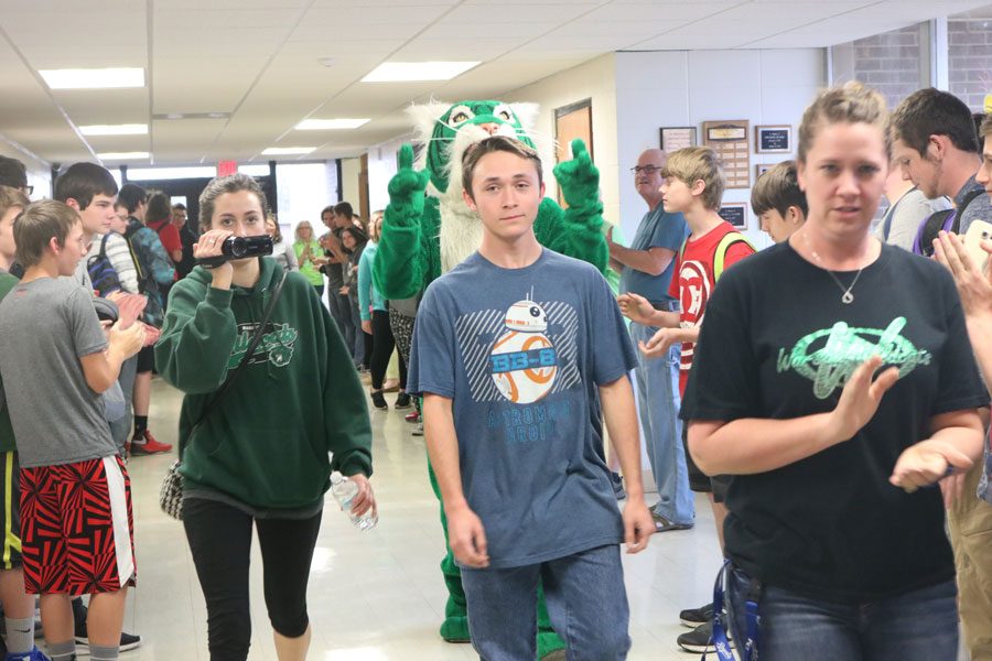 Junior Lee Newell participates in his state walk for archery. Newell competed at state on March 25.