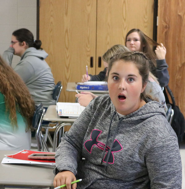 Senior Gabby Flores was caught off guard in her Algebra II class. 
