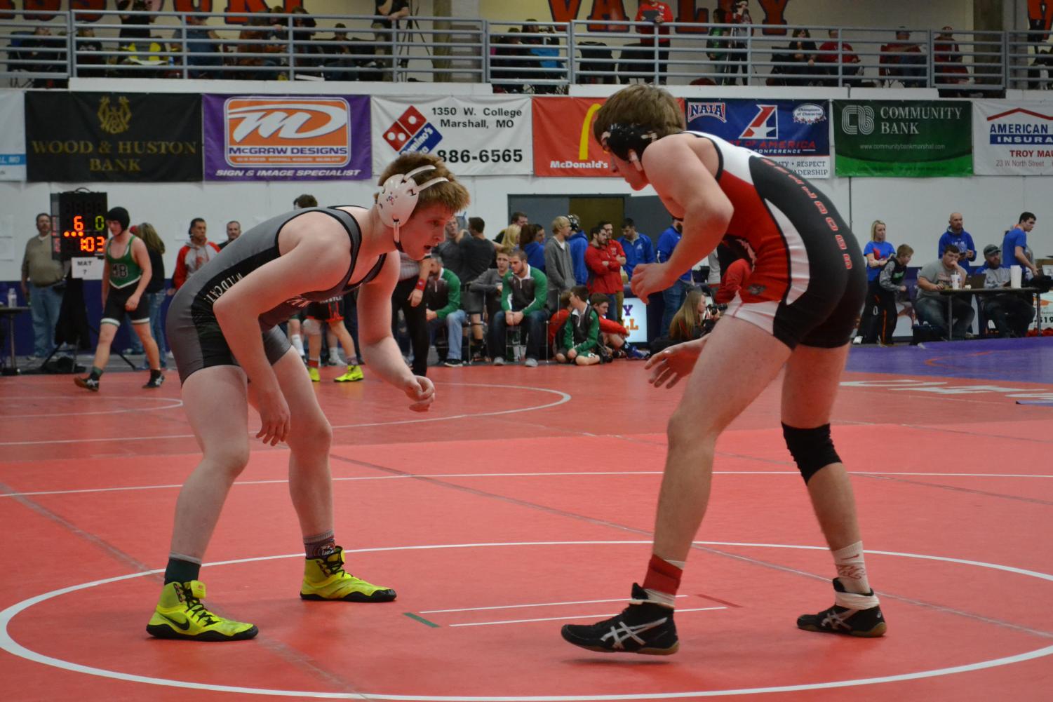 Junior Kolby Estes looks for a shot at his opponent. Estes is currently ranked 1st in the 145 weight class.