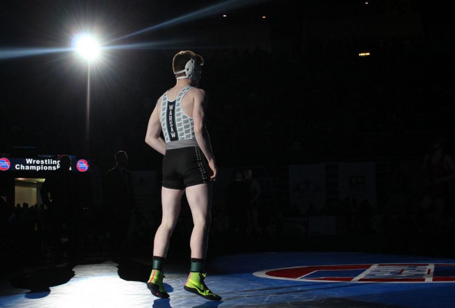 Junior Kolby Estes stands in the spotlight at the state championships. Finals were held Saturday, Feb 17.