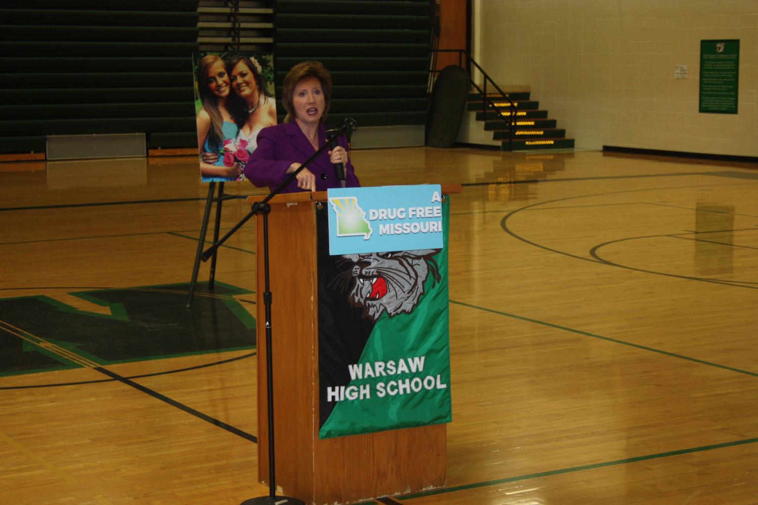 Congresswoman Vicky Hartzler opens the assembly with statistics and information about the status of drug use in the area.