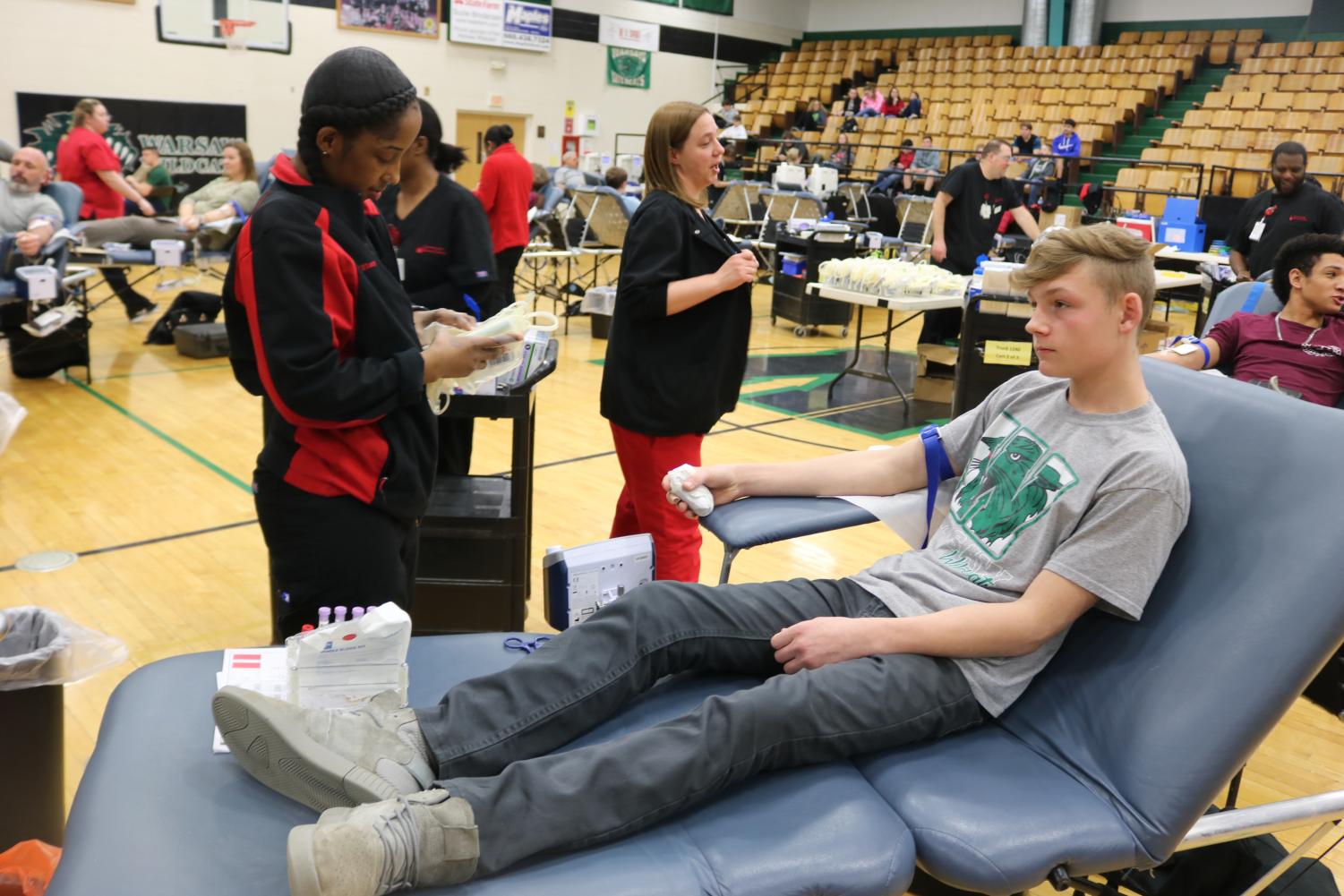 Sophomore Jesse Barckley prepares to donate blood for the first time on the 13th. “I could feel the blood being sucked out of my arm. I was worried about air being pumped into my vein,”Barckley said.
