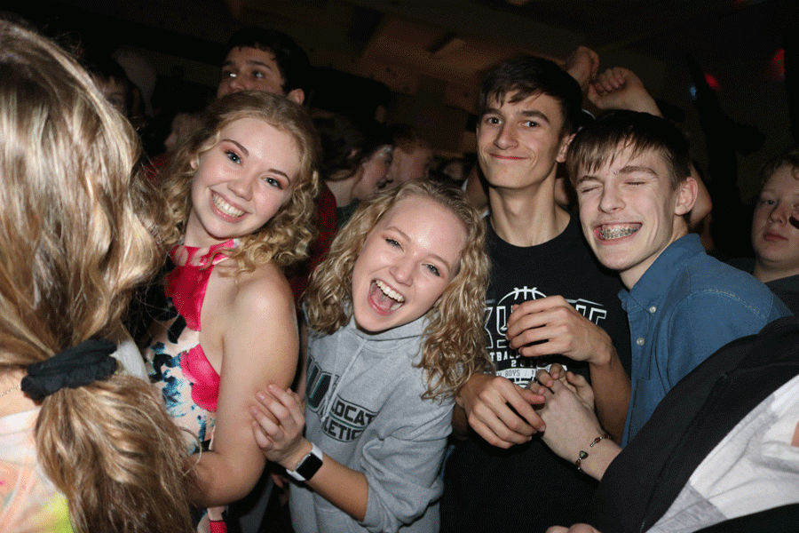 Junior Andrea Merritt, sophomore Aspen Whittaker, and juniors Parker Love and Zach Chapman enjoy the Courtwarming dance. The dance was held in the high school cafeteria on Feb. 8.