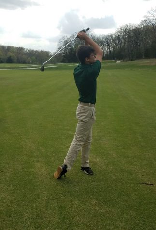 Golf teammates encourage each other as they improve skills
