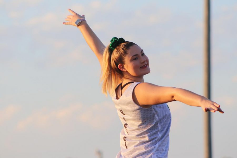 Lauren Kreisel dances at a home football game during the pregame show. The dance team performed with a different dance before every home game during football season. 