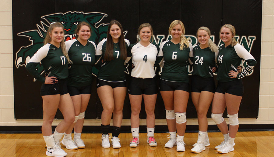 Volleyball+seniors+Rorie+Jenkins%2C+Taylor+Spry%2C+Lea+Mebruer%2C+Kylee+Fajen%2C+Rheanna+Coke%2C+Aspen+Whitaker+and+Brooke+Spry+come+together+for+a+picture+after+their+game+against+the+Sherwood+Marksmen+on+Sept.+3.+Volleyball+seniors+were+recognized+for+all+of+their+hardwork+before+the+Varsity+game+on+Sept.+3.