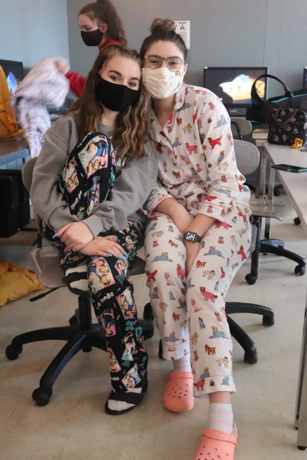 Seniors Darby Mostaffa and Lauren Kreisel sport their PJ’s for Monday’s spirit week theme, The Polar Express. “PJ day is a tradition I always look forward to and it always makes coming to school easier,” Mostaffa said. 
