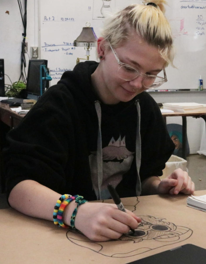 Sophomore Jaxton Todd sketches in art class. His art style first came from ‘How to Draw’ books and cartoons but have developed into a more unique style.