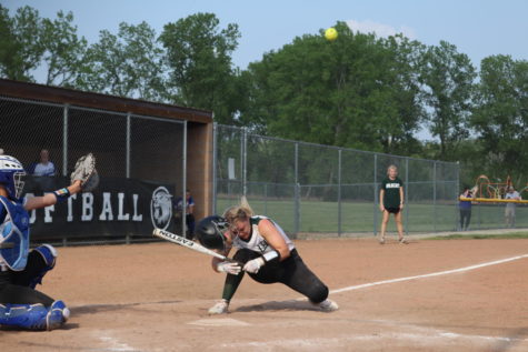 Senior Taylor Howe gets hit in the head by a wild pitch at their final game of season at districts. The lady cats fell short the second round of districts against the Lone Jack Mules. 
