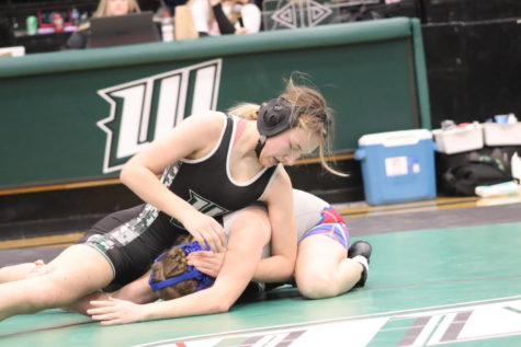Junior Skylon Boone wrestles an opponent at the Jan. 31 Tri against Windsor and Boonville. The girls’ team won the Tri.