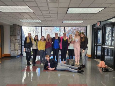 Members of Warsaw High’s FBLA gather at contest. They include (front) sophomore Logan Gemes, (back) seniors Whitney Brown, Abby Dendish, sophomore Ashlyn Adams, junior Sarah Gilbert, seniors Jenny Jones, Abi Feltrop, Jazz Swisher, Ashlyn Laue and Anna Siegel. Four qualified for state contest.