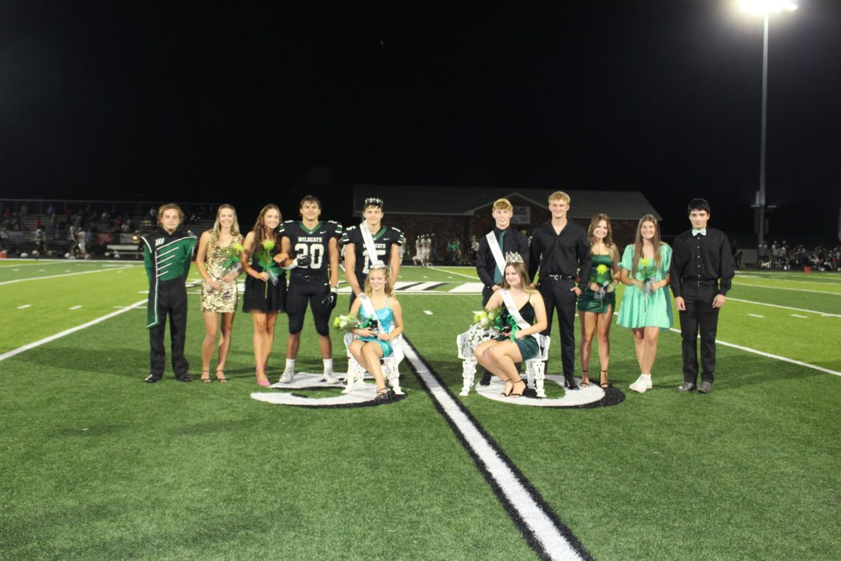The 2023 Homecoming court celebrates coronation at the half time ceremony. They included juniors Elijah Long and Haylee Cobb, Brylee Brewster and Jayce Depriest, Prince Drake Murrell and Princess Alysia Yoder, King Nate Banfield and Queen Rachel Henderson, senior candidates Dylan Elmer, Randi Buchholz, Josephine Kelsey and Zane Huffman.