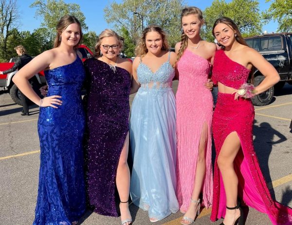 Seniors (left to right) Rachel Henderson, Dallas Steinhoff, Autum Walton, Grace Drake, and Angela Konopasek attended the 2023 prom together. They were juniors at the time.