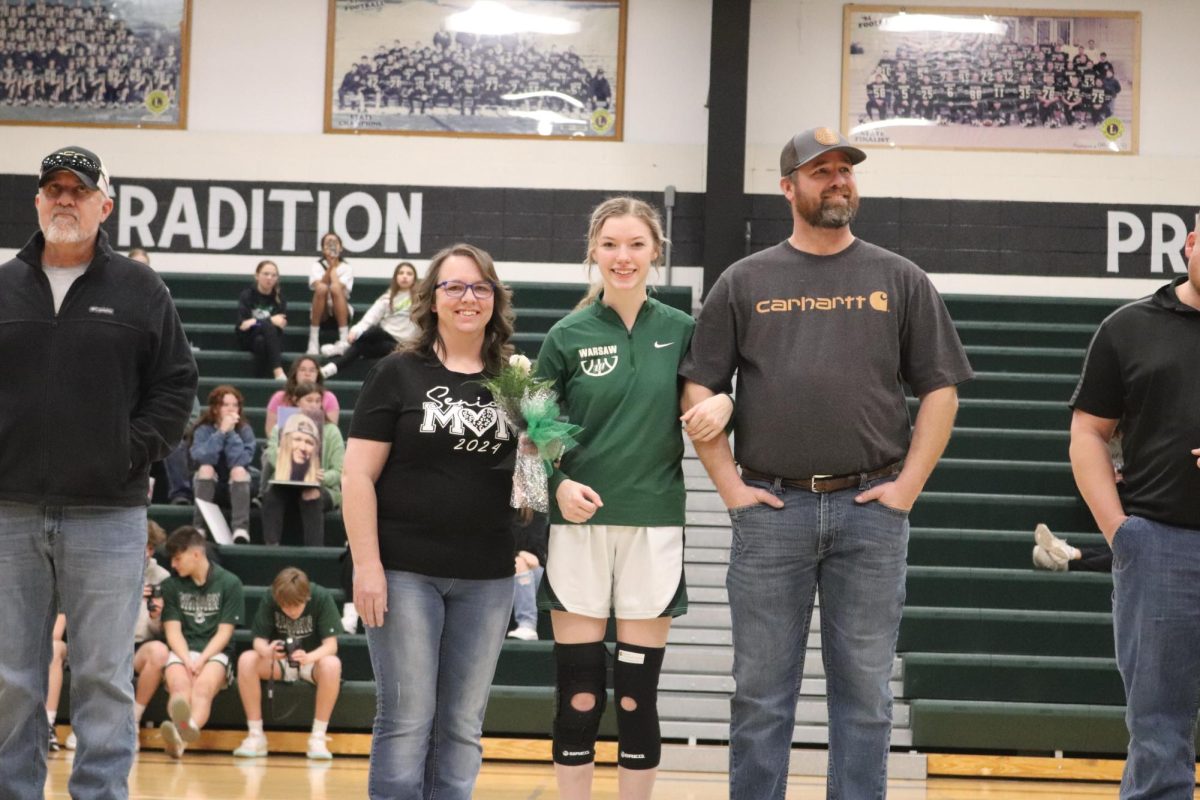 Senior Grace Drake is honored during the senior night ceremony on Jan. 30. Drake only began her basketball journey in high school and has played varsity for the past three years.