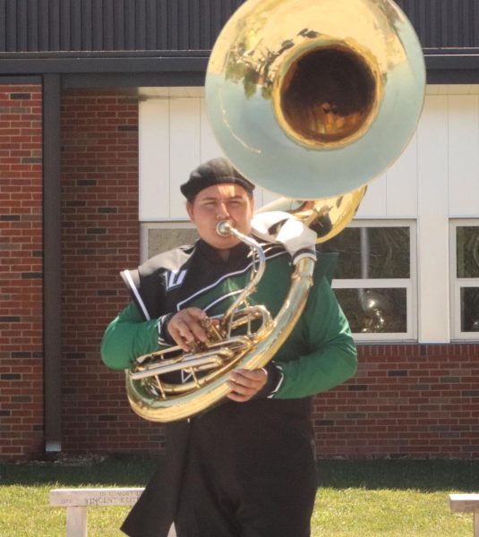 Junior Jayden Culbertson performs with his tuba for an OHC competition. Culbertson marched for the event in September of 2023.