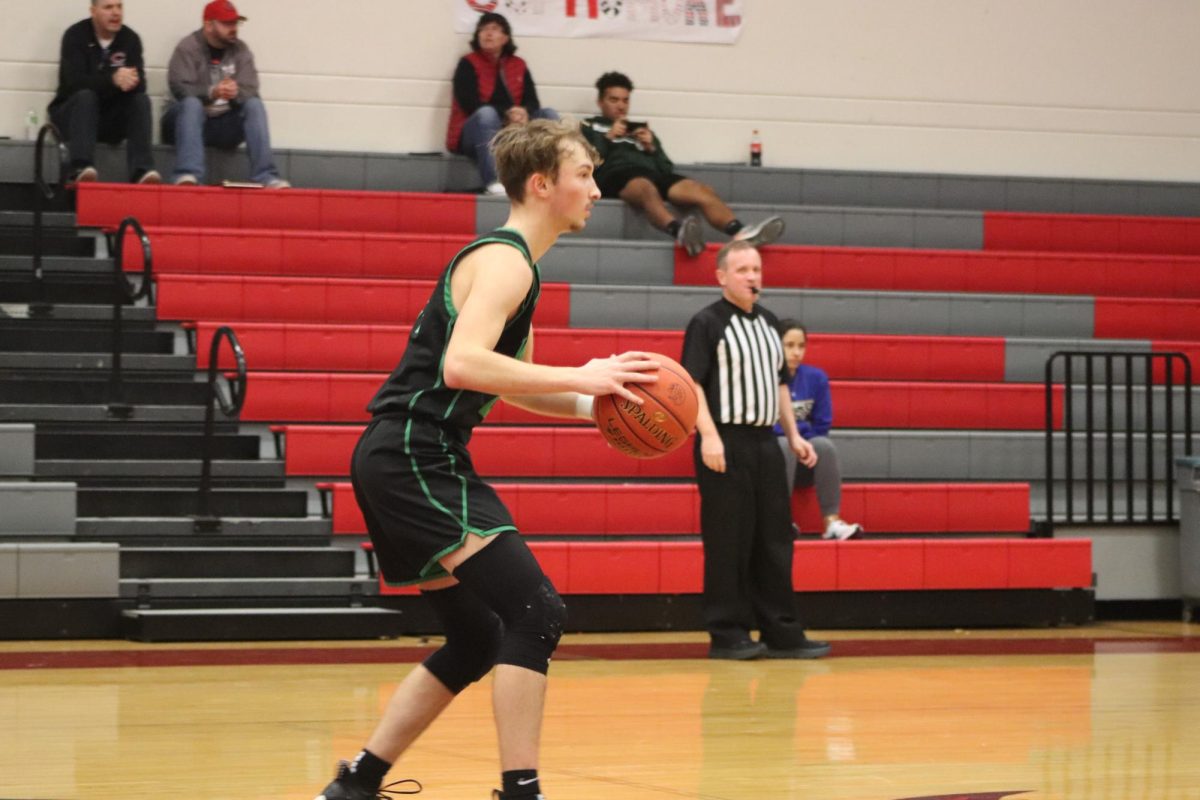 Junior Logan Gemes plays offense at a home game. Gemes was honorable mention All-Conference and All-District.