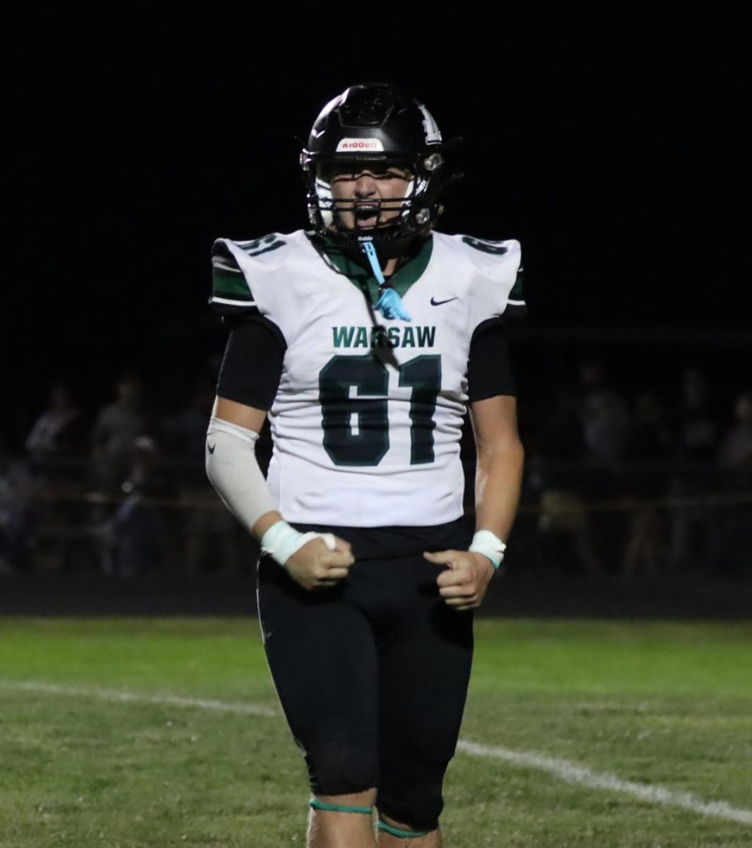 Senior Kendall Bagely celebrates a good play against Adrian. This Bagley’s fourth year playing high school football