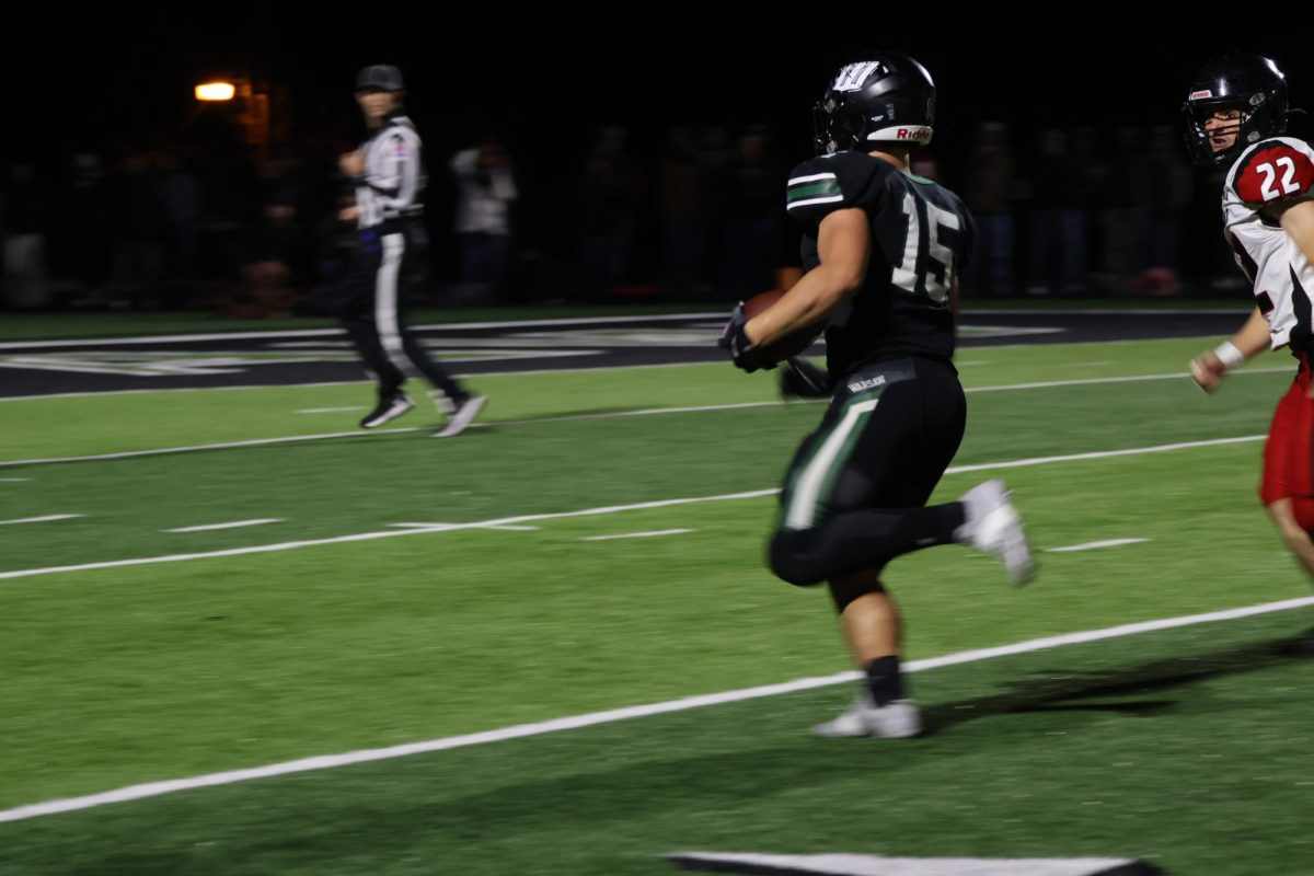 Senior running back Drake Murrell runs the ball on Nov 15. Murrell made plays the whole game