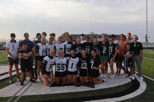 The teams get together for a picture before heading to the locker room for the pre-game pep talk. They included: (front row) sophomore Maylee Slavens, junior Kaleby Stevenson, Tanna Howe, freshman Braylee Cunningham, senior Tatum Bohl; (second row) 5th grader Henry Adler, sophomore Mady Reimund, Alenah Yoder, junior Jessie Bilderback, Hailey Ferguson, freshman Alyssa Boyd, Addison Hill, Amelia Roberts, senior Keira Mostaffa, Brylee Brewster, 5th grader Kylie Ferguson; (back row) juniors Brennen Slavens, Josh Harvath, Ryan Fajen, Ayden Burdick, Luke Henderson, sophomore Jenna Gerken, seniors Kendall Bagley, Shane Poyser, Dakota Todd, Trent Downing, Drake Murrell, Jayce Depriest, Logan Gemes, and Garrett Ferguson. 