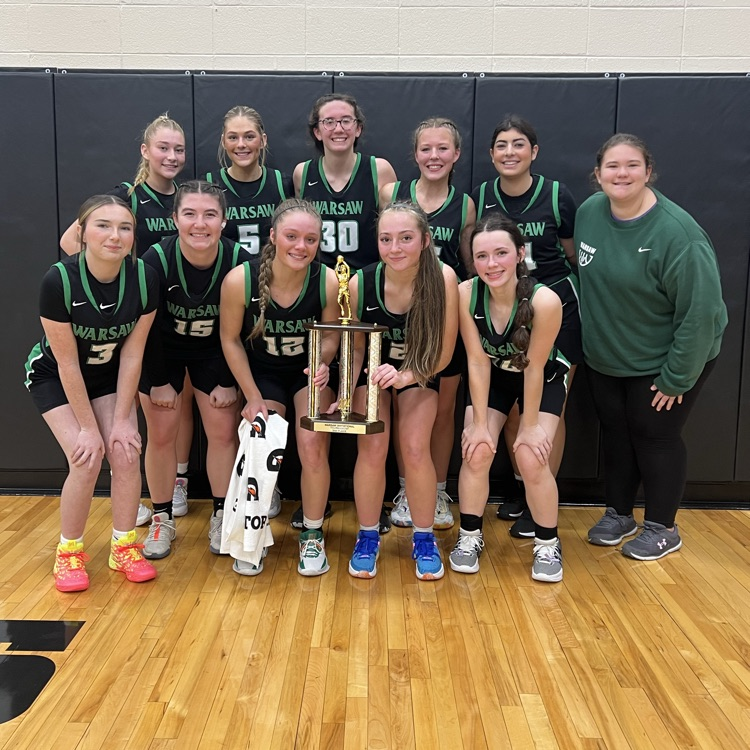 Lady Cats basketball team gathers for a picture after a tough loss to Skyline. They finished second in the Warsaw tournament.