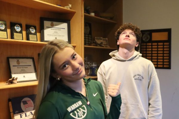 Sophomore Mady Reimund and junior Luke Henderson hang out together. Reimund and Henderson have been in a relationship for two years and nine months. 