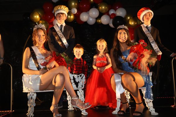 Echoes royalty winners celebrate after coronation. The court includes senior king Jaxson Deckard, senior queen Samantha Harr, crown bearer Braxtyn Brown, flower girl Blair Arnett, junior prince Tyler Fajen, and junior princess Hazal Uelker.

