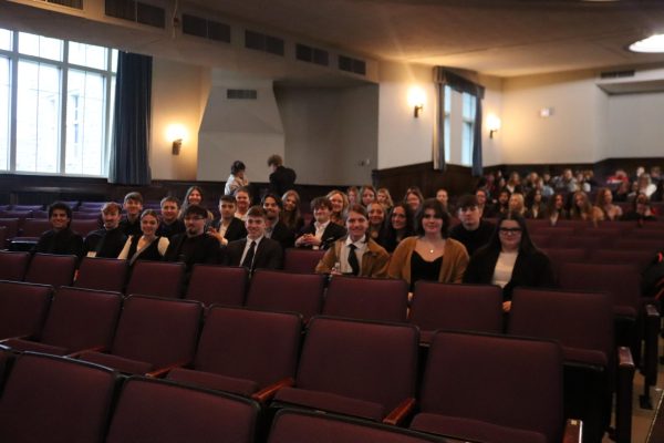 FBLA members prepare to listen to the keynote speaker at the opening session of the district FBLA conference at the University of Central Missouri. Students attended sessions and competed on Feb. 6. Eleven qualified for state.